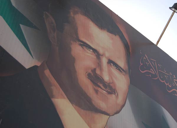 Syryjski billboard przedstawiający Baszara al-Assada (Flickr: tgraham-cc)